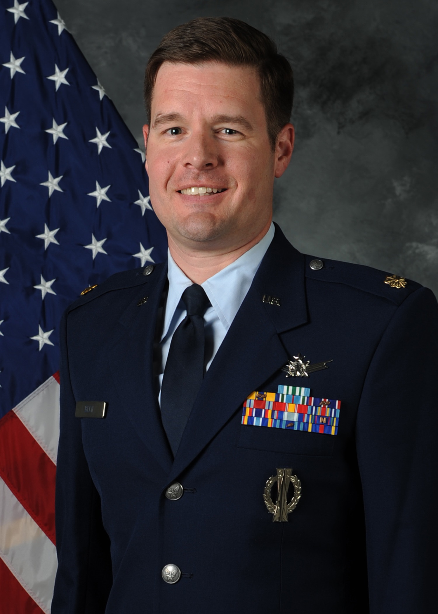 Photo of Maj Mathew Beck, USAF wearing military uniform