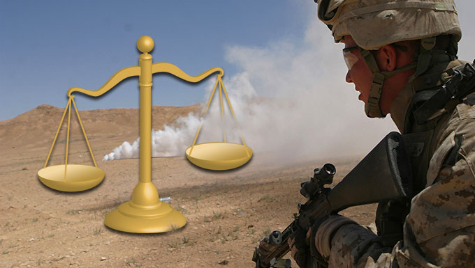 Profile of US soldier with weapon in desert. A smoke bomb is going off in the background and an image of scales appears on the lefthand side.