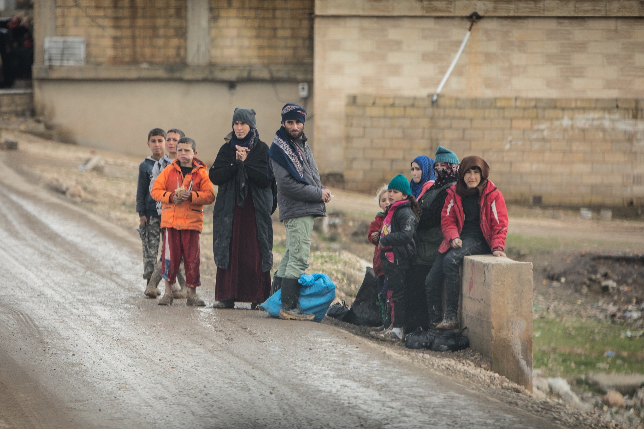 Syrian children waiting for school bus
