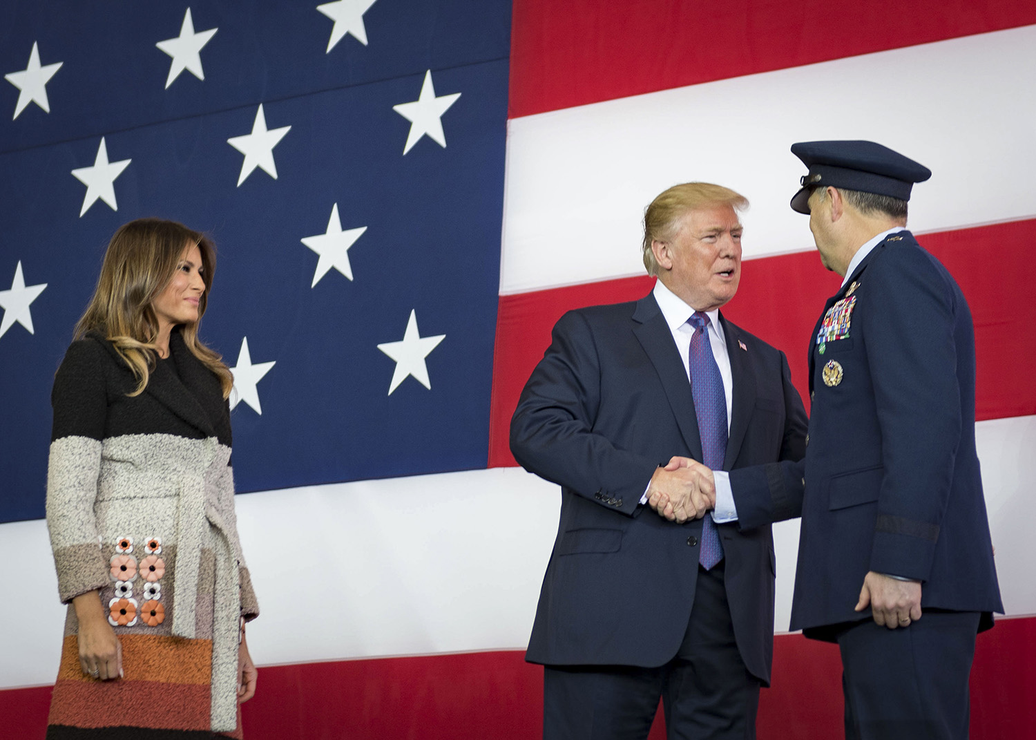 Trump visits Yokota Air Base, Japan. Pres. Donald J. Trump greets Lt Gen Jerry P. Martinez, US Forces Japan and 5th Air Force commander, during a Troop Talk, 5 November 2017, at Yokota Air Base, Japan. During his talk, Trump highlighted the importance of the US–Japan alliance in the Indo-Pacific.