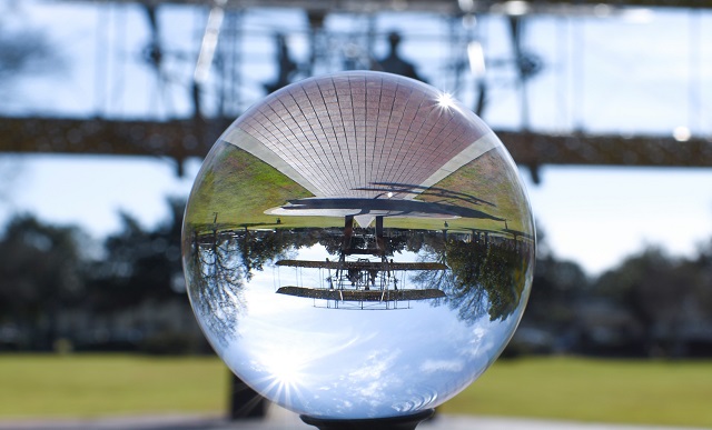Wright Flyer Reflected in Globe Wright Flyer Reflected in Globe