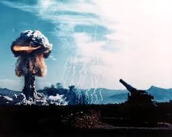 Photo of nuclear explosion on left and gunship on right. As a shell, or artillery-fired atomic projectile (AFAP), the device was the first one of its kind, and the test itself remains the only nuclear artillery shell ever fired in the United States’ nuclear weapons test program. Codenamed Grable, the test occurred in 1953 at the Nevada Test Site. Courtesy of nuclearvault.