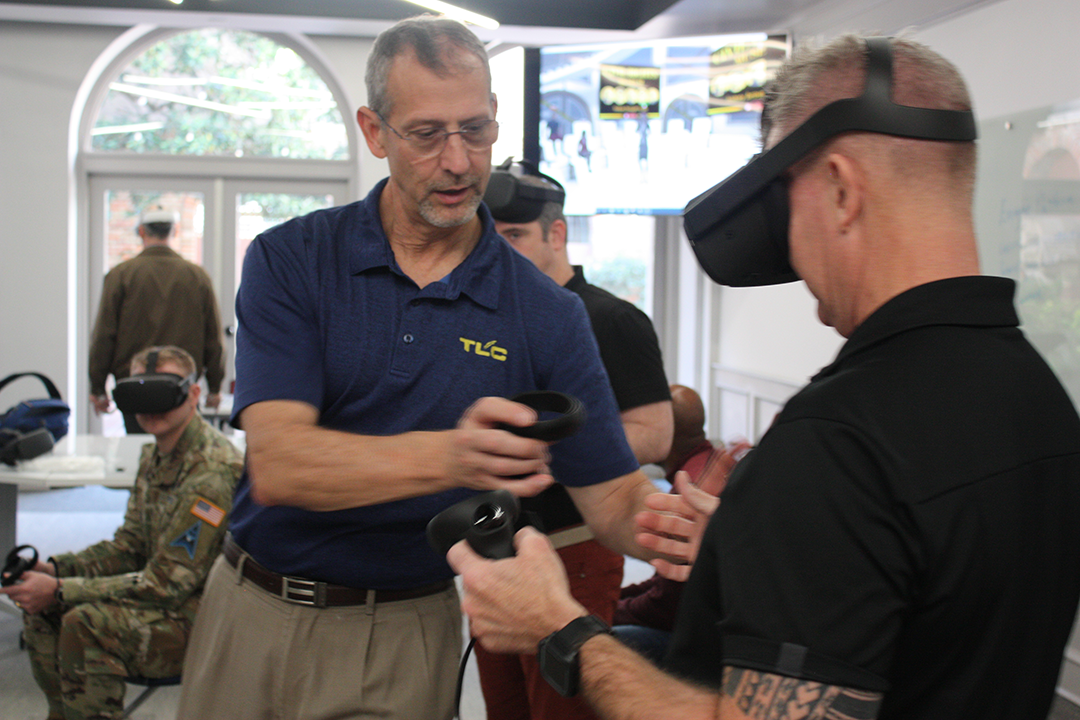 Two people using virtual reality gear